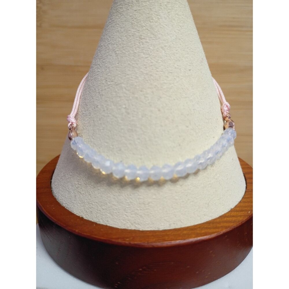 Dainty Liz Claiborne cord Bracelet Featuring Crystal beads Rose Gold Tone Clasp